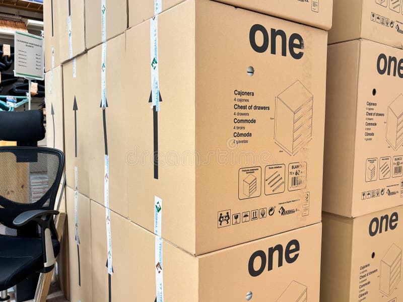 Neatly stacked and labelled moving boxes